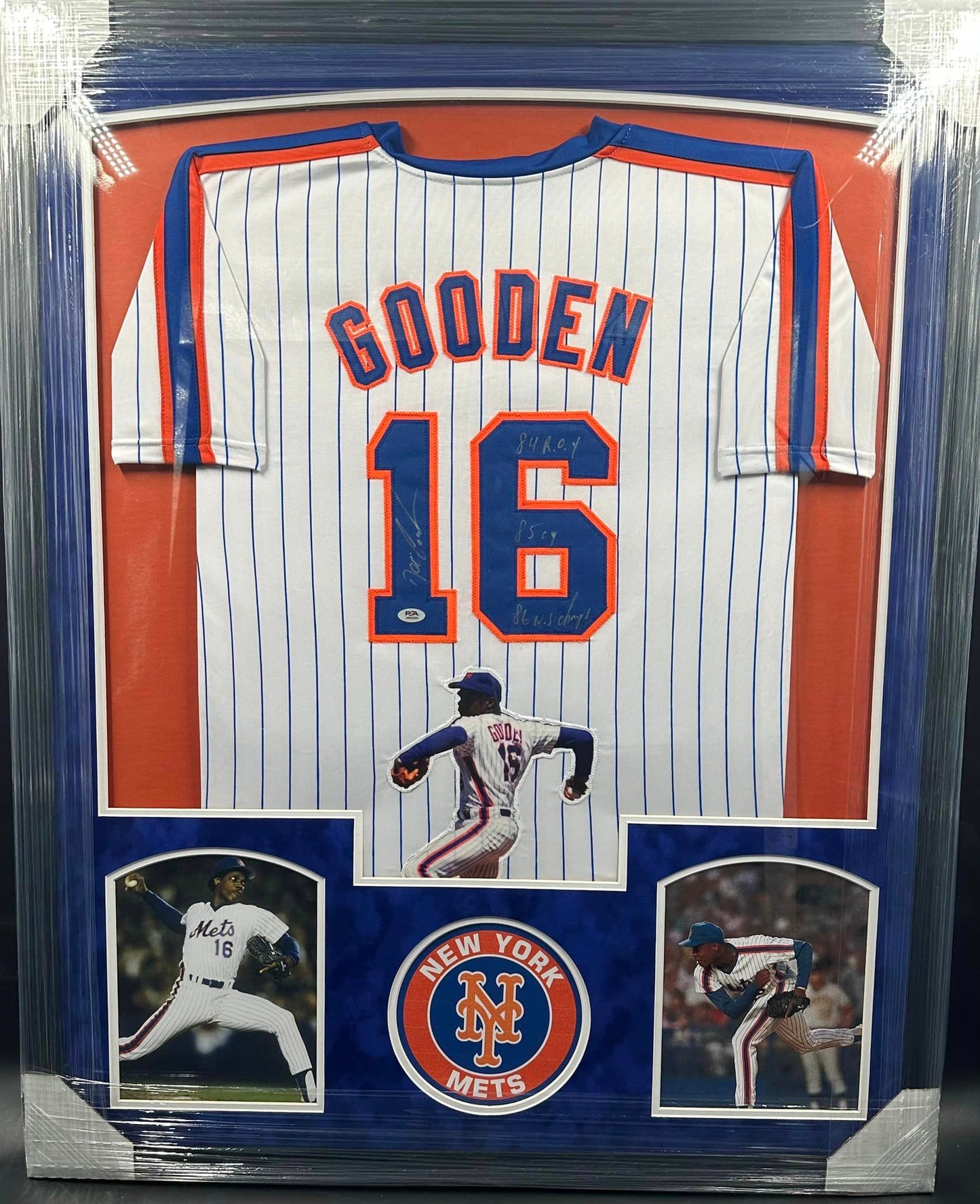 New York Mets Dwight Gooden Hand Signed Autographed Custom Pin Striped Jersey with 84 R.O.Y, 85 cy, & 86 W.S Champs Inscriptions Framed & Suede Matted with PSA COA