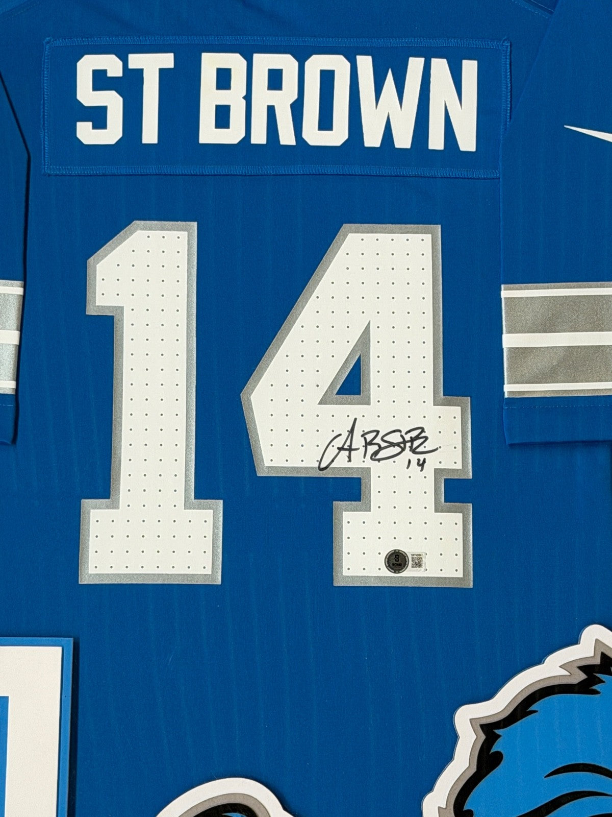 Amon-Ra St. Brown Lions Custom Framed Jersey Beckett COA