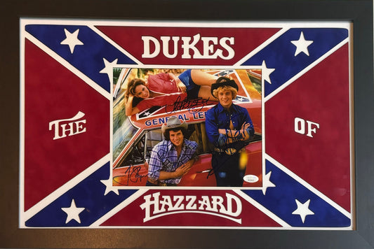 The Dukes of Hazzard "Luke Duke" Tom Wopat, "Daisy Duke" Catherine Bach, & "Bo Duke" John Schneider Triple Hand Signed Autographed 8x10 Photo Custom Framed & Cutout Suede Matted with JSA COA