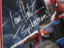 Load image into Gallery viewer, Spider-Man Movie Series &quot;Peter Parker&quot; Tom Holland Hand Signed Autographed 11x17 Photo with Spiderman! Inscription Framed &amp; Matted with COA