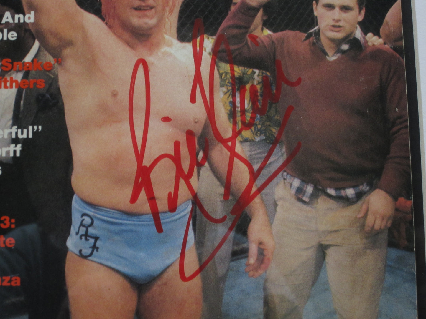 American Professional Wrestler Ric Flair Hand Signed Autographed Wrestling's Main Event Magazine Framed & Matted with PSA COA