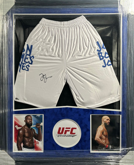 UFC Heavyweight Champion Jon "Bones" Jones Hand Signed Autographed White Trunks Framed & Suede Matted with BECKETT COA
