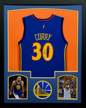 Load image into Gallery viewer, Golden State Warriors Stephen Curry Signed Blue Jersey Framed &amp; Matted with COA