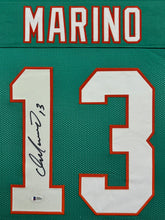 Load image into Gallery viewer, Miami Dolphins Dan Marino Signed Teal Jersey Framed &amp; Suede Matted with Video Screen BECKETT COA