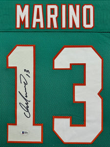 Miami Dolphins Dan Marino Signed Teal Jersey Framed & Suede Matted with Video Screen BECKETT COA