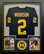 Load image into Gallery viewer, University of Michigan Wolverines Charles Woodson Hand Signed Autographed Blue Jersey Framed &amp; Matted with COA