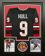 Load image into Gallery viewer, Chicago Blackhawks Bobby Hull Hand Signed Autographed Black Jersey with The Golden Jet &amp; HOF 1983 Inscriptions Framed &amp; Matted with JSA COA