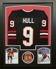 Load image into Gallery viewer, Chicago Blackhawks Bobby Hull Hand Signed Autographed Black Jersey with &#39;61 Cup Inscription Framed &amp; Matted with BECKETT COA