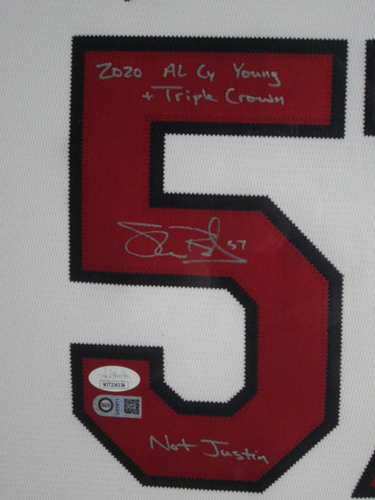 Cleveland Indians Shane Bieber Hand Signed Autographed Jersey with 2020 AL CY Young + Triple Crown & Not Justin Inscriptions Framed & Matted with JSA COA