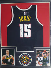 Load image into Gallery viewer, Denver Nuggets Nikola Jokic Signed Jersey with 2021 NBA MVP &amp; The Joker Inscriptions Framed &amp; Matted with JSA COA