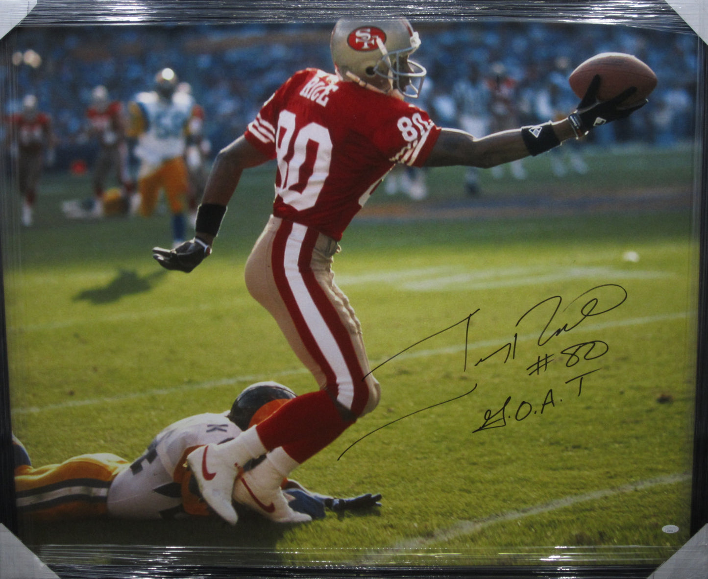 San Francisco 49ers Jerry Rice Hand Signed Autographed Large Canvas with G.O.A.T Inscription Framed & Matted with JSA COA
